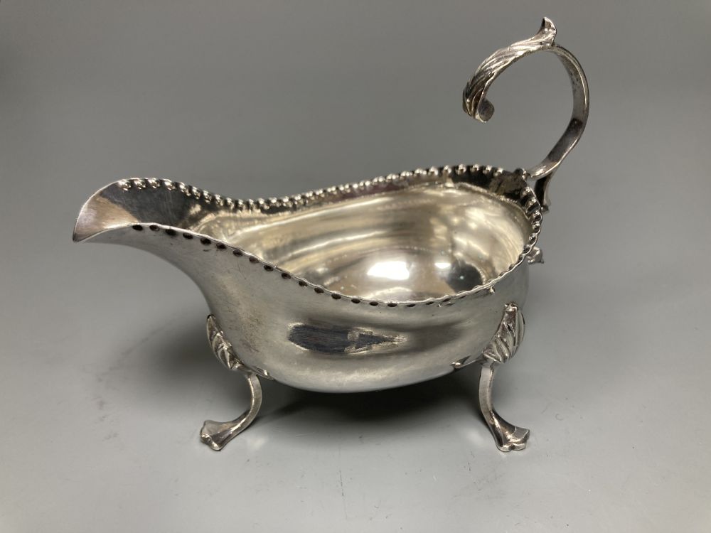A George III silver sauceboat, Charles Hougham, London, 1781, height 9.5cm, 104 grams.